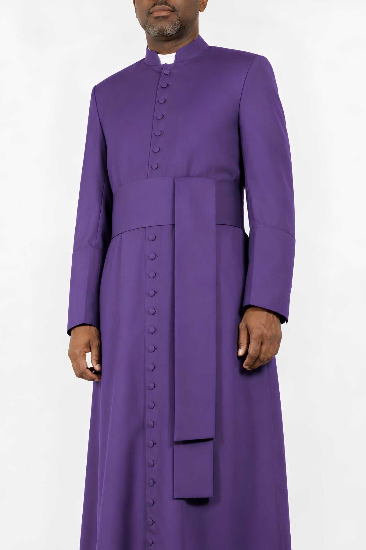 Close-up of button-front closure and cincture sash on Roman purple cassock for men