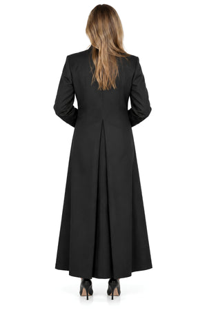 Back view of a women’s black clergy cassock with long sleeves and full-length pleated skirt