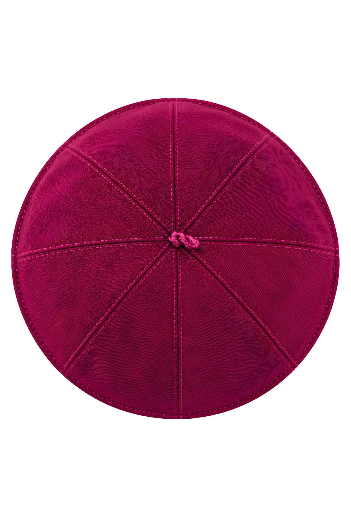 Top view of a magenta clergy zucchetto cap showing eight stitched fabric panels converging at the center crown loop.

