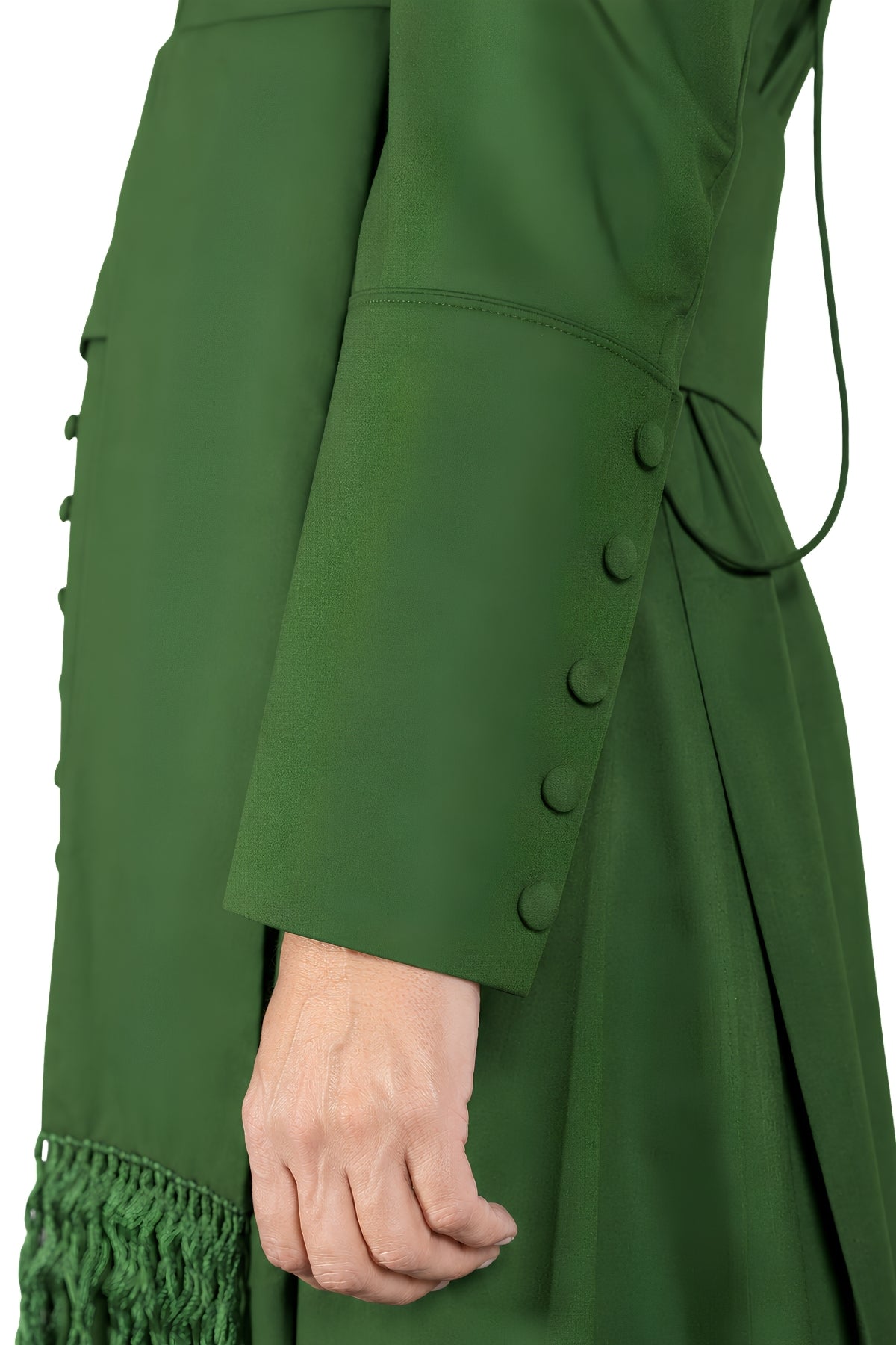 Close-up of cuff buttons and fringed cincture tassel on solid green cassock for men